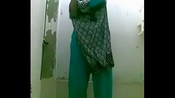 bottle bating indian wife in shower for a selfie